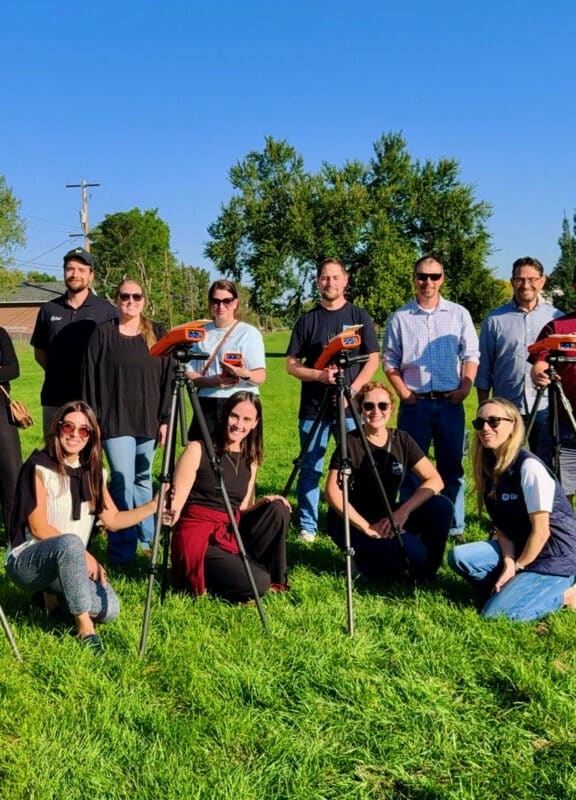 The IKE team out in the field training with the IKE Device on pole data collection.